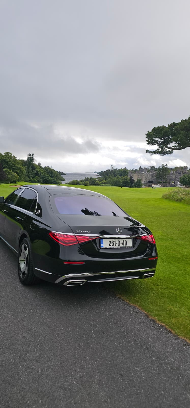 Mercedes-Maybach S-Class beside a lakeside Irish estate