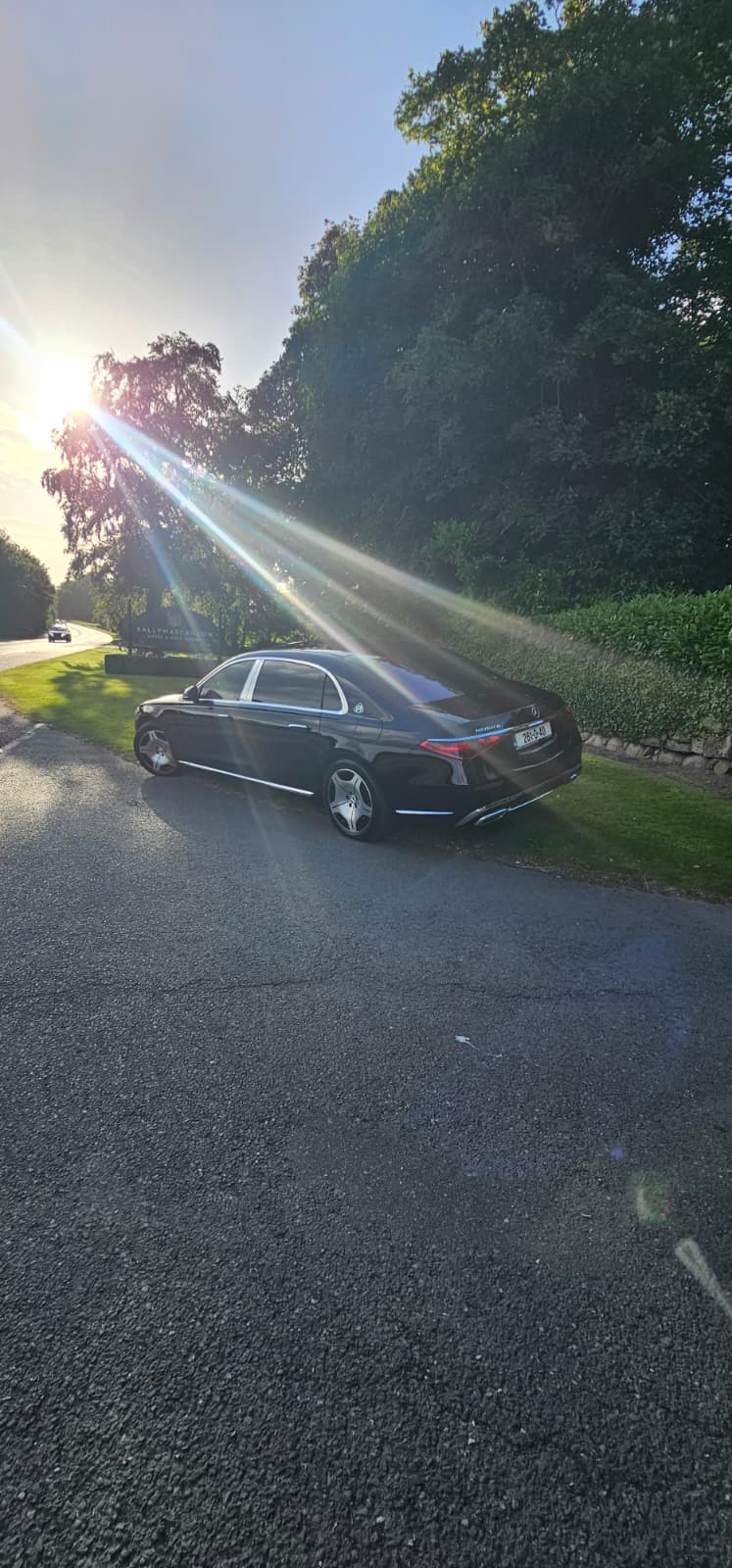 Mercedes-Maybach S-Class on a private estate driveway at sunset